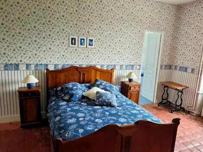 Un ou plusieurs lits dans un hébergement de l'établissement La ferme des douceurs