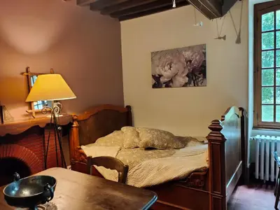 Un ou plusieurs lits dans un hébergement de l'établissement La ferme des douceurs
