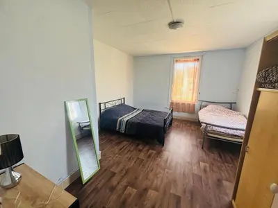 Un ou plusieurs lits dans un hébergement de l'établissement Maison de campagne