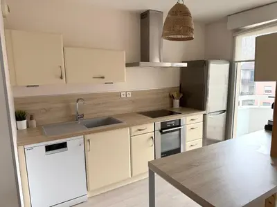 Cuisine ou kitchenette dans l'établissement Charmant appartement tout confort