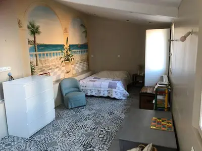 Un ou plusieurs lits dans un hébergement de l'établissement AUTUN Maison 4 chambres 7/9 pers - cour ombragée proche commerces