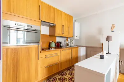 Cuisine ou kitchenette dans l'établissement Le Lilas - Hypercentre Confort Calme 4 voyageurs