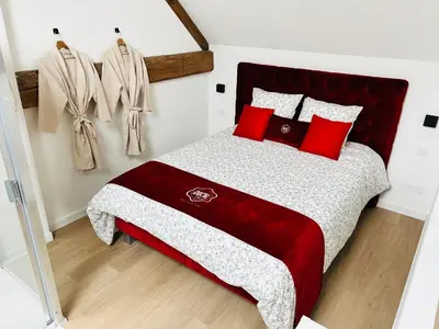 Un ou plusieurs lits dans un hébergement de l'établissement Nos 3 spas de bourgogne (3minutes de Beaune)