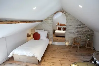 Un ou plusieurs lits dans un hébergement de l'établissement Couette&Living - Maison design à Savigny-les-Beaune