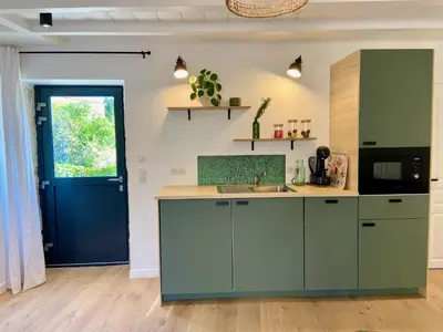 Cuisine ou kitchenette dans l'établissement La petite Maison Messigny