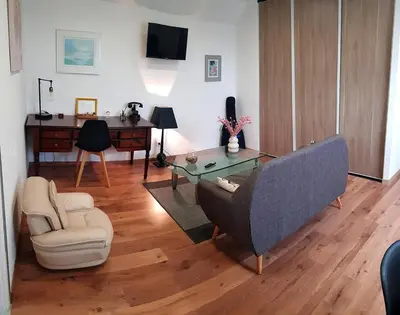 Télévision ou salle de divertissement dans l'établissement LE CLOS DES PRAIRIES Suite 2 grandes chambres