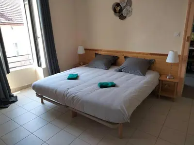 Un ou plusieurs lits dans un hébergement de l'établissement Gîte de la tour