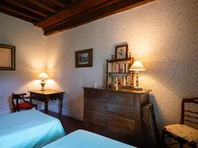 Un ou plusieurs lits dans un hébergement de l'établissement Holiday Home La Maison du Chateau by Interhome