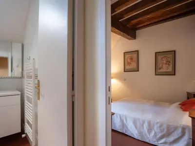 Un ou plusieurs lits dans un hébergement de l'établissement Holiday Home La Maison du Chateau by Interhome
