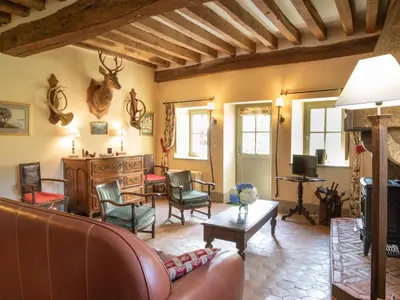 Coin salon dans l'établissement Holiday Home La Maison du Chateau by Interhome