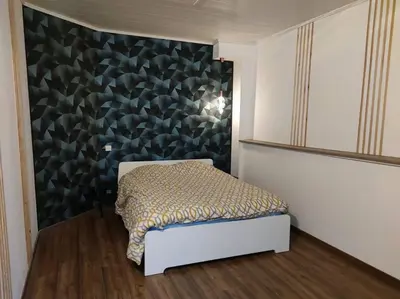 Un ou plusieurs lits dans un hébergement de l'établissement Grand Appartement 82m2 Quartier historique Pasteur