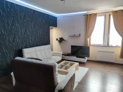 Coin salon dans l'établissement Grand Appartement 82m2 Quartier historique Pasteur