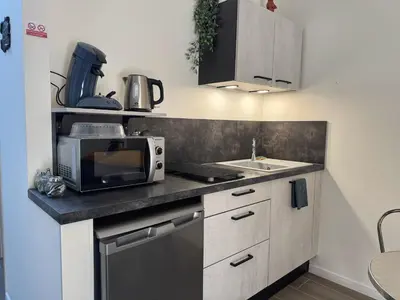 Cuisine ou kitchenette dans l'établissement nuitzen