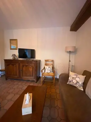 Télévision ou salle de divertissement dans l'établissement Gîte à la ferme