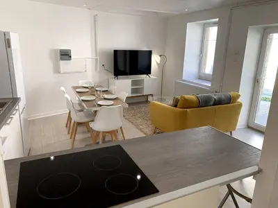 Télévision ou salle de divertissement dans l'établissement Gîte Cadet Roussel - Orgelet