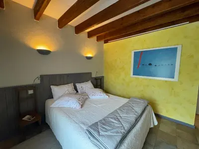 Un ou plusieurs lits dans un hébergement de l'établissement Inspirations - Chambres d'hôtes