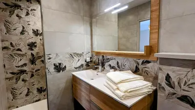 Salle de bains dans l'établissement Le Clos des écureuils - chambres d'hôtes