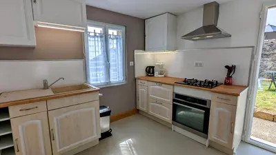 Cuisine ou kitchenette dans l'établissement Le Cocon des Hautes-Côtes