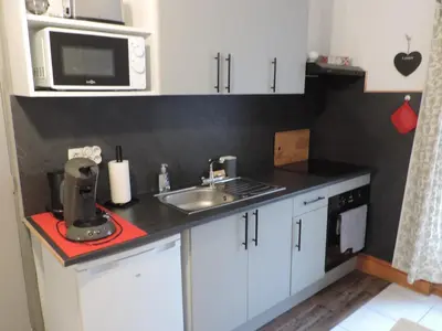 Cuisine ou kitchenette dans l'établissement Auprès du Lavoir