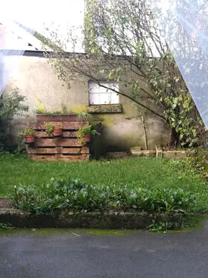 Jardin de l'établissement Charmante chambre dans village jurassien