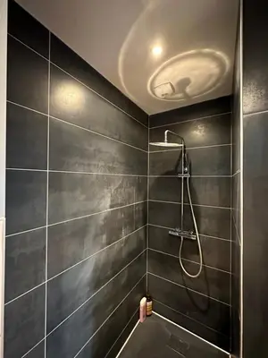 Salle de bains dans l'établissement LES ANTHOCYANES
