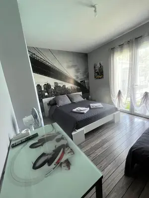 Un ou plusieurs lits dans un hébergement de l'établissement Chambres d'Hôtes chez Estelle