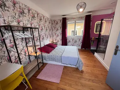 Un ou plusieurs lits dans un hébergement de l'établissement Maison Chez Marinette
