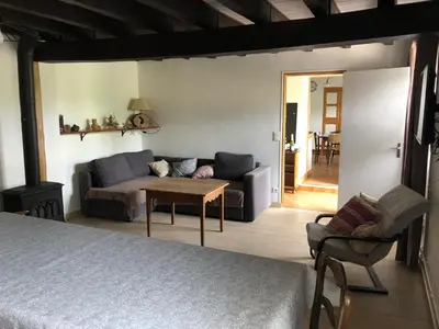 Coin salon dans l'établissement Gîte du champ de la Briette