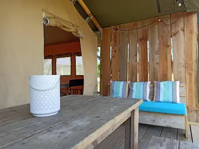 Coin salon dans l'établissement Le Lodge du Hibou