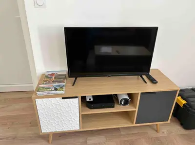 Télévision ou salle de divertissement dans l'établissement Le St Martin Appart'