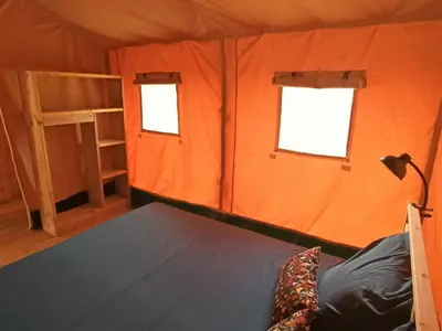 Un ou plusieurs lits dans un hébergement de l'établissement Le Lodge de la Chouette