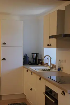 Cuisine ou kitchenette dans l'établissement Le Gîte des 2 Fontaines