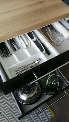 Cuisine ou kitchenette dans l'établissement 555 Appartement calme et climatisé au cœur du village