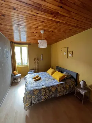 Un ou plusieurs lits dans un hébergement de l'établissement La maison de Command