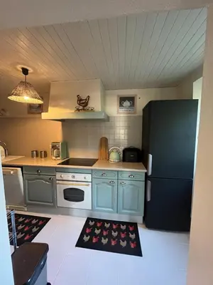 Cuisine ou kitchenette dans l'établissement La maison de Command