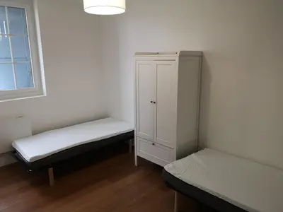 Un ou plusieurs lits dans un hébergement de l'établissement Le Cosy de Paray 4 couchages