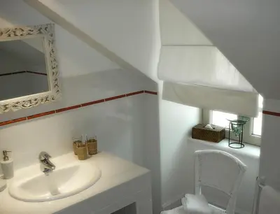 Salle de bains dans l'établissement Gîte de la corgette