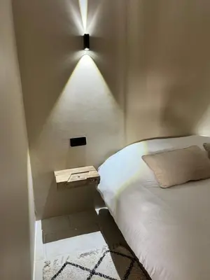 Un ou plusieurs lits dans un hébergement de l'établissement Maison au bord de l'eau Les Roches