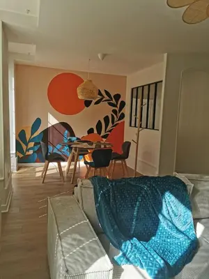 Coin salon dans l'établissement Les clos de Givry - Clos Léonie - Appartement 68m2 spacieux, lumineux et avec sauna