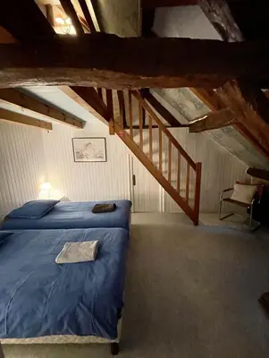 Un ou plusieurs lits dans un hébergement de l'établissement Grand gîte de charme à 10 min de Beaune 11-13 pers