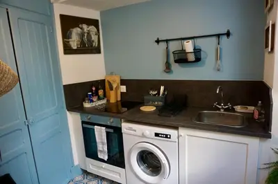 Cuisine ou kitchenette dans l'établissement Gîte de charme Autun'Home