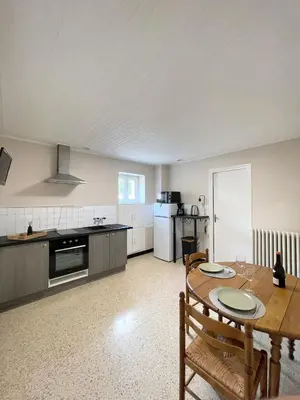 Cuisine ou kitchenette dans l'établissement Maison au pied de la Roche