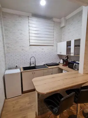 Cuisine ou kitchenette dans l'établissement Appartement Centre ville