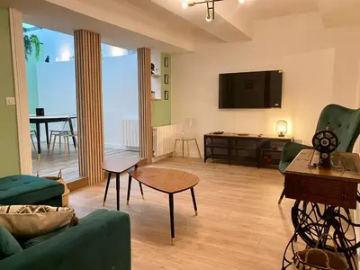 Télévision ou salle de divertissement dans l'établissement Cité Gastro. / Centre Ville