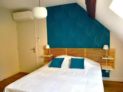Un ou plusieurs lits dans un hébergement de l'établissement CHAMBRE D HOTES AU COEUR DE MEURSAULT