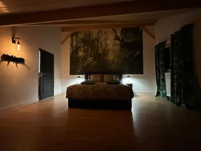 Un ou plusieurs lits dans un hébergement de l'établissement les anthocyanes CHAMBRE FORET
