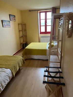 Un ou plusieurs lits dans un hébergement de l'établissement La Maison du Canal