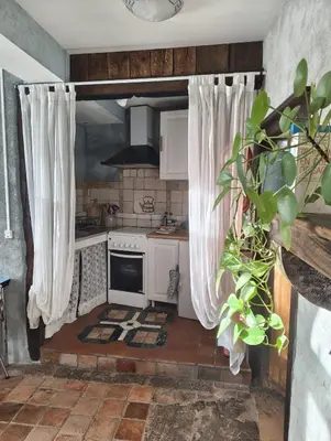 Cuisine ou kitchenette dans l'établissement Mine d'Ore Petit Gîte de la Chouette d'Or