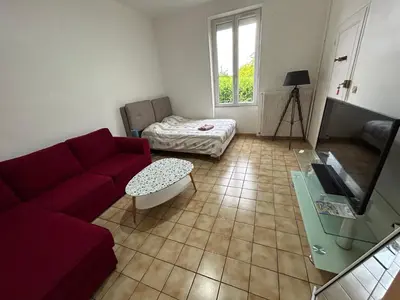 Télévision ou salle de divertissement dans l'établissement Chambre