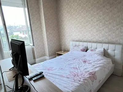Un ou plusieurs lits dans un hébergement de l'établissement Chambre